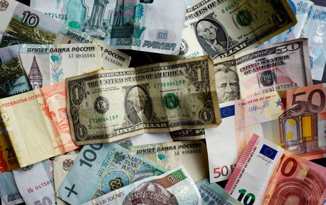 Banknotes of different currencies, including Euro, US Dollar, Turkish Lira or Brazilian Reais are photographed in Frankfurt, Germany, in this illustration photo taken on May 7 (Reuters photo)