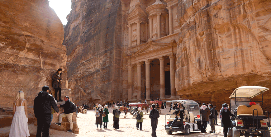 Tourists at the rose-red city of Petra, some 220 kilometres south of Amman (Photo by Amjad Ghsoun)