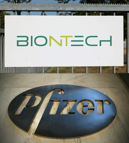 This combination of photos created on November 9 shows (top, file photo taken on September 18) the logo of German biopharmaceutical company BioNTech at its headquarters in Mainz, western Germany, and (bottom, file photo taken on May 5, 2014) the logo of Global pharmaceutical company Pfizer at their world headquarters in Manhattan in New York (AFP photo)