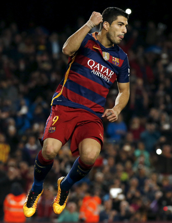 Barcelona’s Luis Suarez celebrates a goal against Sporting Gijon on Saturday (Reuters photo)