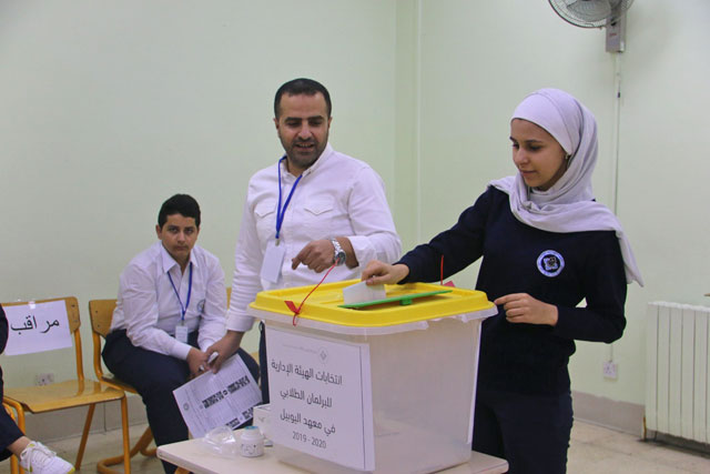 A student casts her vote during school council elections at the Jubilee School on Wednesday (Photo courtesy of Jubilee School)