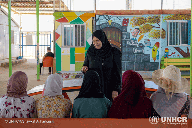 Shokreh Al Masalmeh sharing her personal experience on child marriage at a community centre in Zaatari refugee camp (Photo courtesy of UNHCR/Shawkat Al Harfoush)