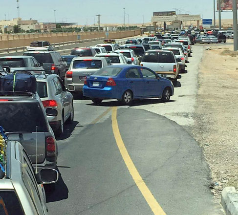 Cars crossing from Saudi Arabia are seen in this July 3 photo at the Omari Border Crossing  (Photo courtesy of Anas Adwan)