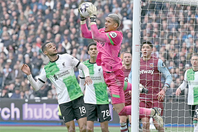 West Ham United’s French goalkeeper #23 Alphonse Areola claims the ball during the English Premier League football match between West Ham United and Liverpool at the London Stadium, in London on Saturday (AFP photo)