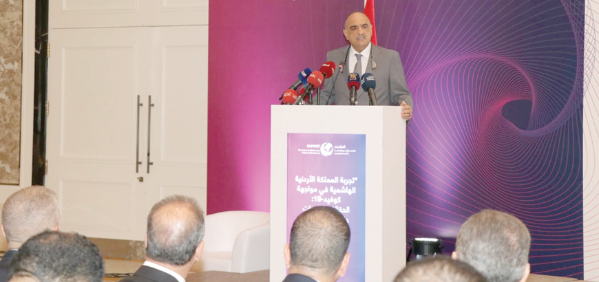 Prime Minister Bisher Al Khasawneh addresses the opening ceremony of the conference titled ‘Jordan's experience in dealing with the COVID-19 pandemic: Facts, challenges and available opportunities’ in Amman on Saturday (Petra photo)