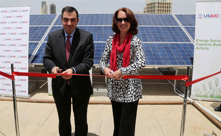 Minister of Planning and International Cooperation Imad Fakhoury and USAID Mission Director Beth Paige inaugurate a solar power project at the ministry on Tuesday (Petra photo)