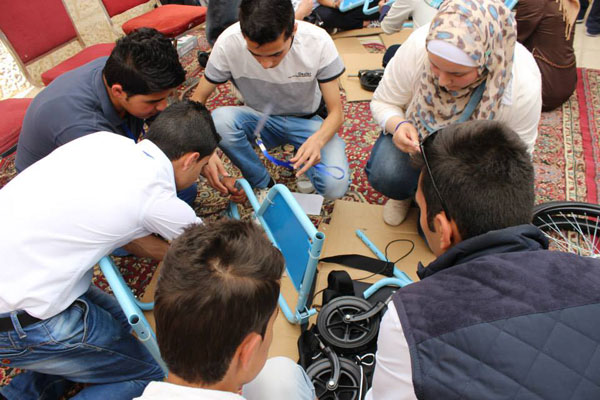 Young people in Karak engage in constructive activities at a creativity club (Photo courtesy of Karak Creativity Club)