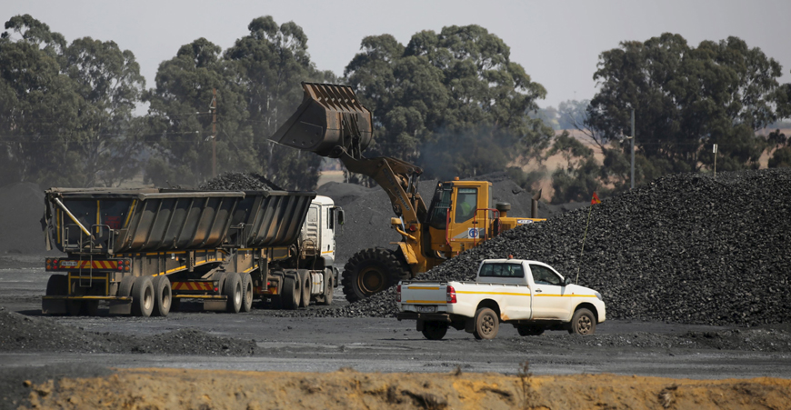 Coal is loaded onto a truck at the Woestalleen colliery near Middleburg in Mpumalanga province, this week. Glencore will provide financial support for its South African mining unit for a coal deal with power utility Eskom as the mine restarts supplying the commodity, the unit’s business rescue practitioners said (Reuters phot)