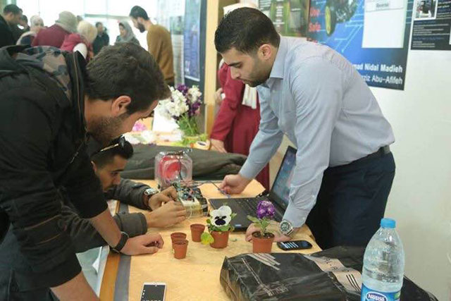 University of Jordan students tour an exhibition held on the sidelines of a ‘Youth, Innovation, and Entrepreneurship Day on Sunday (Photo courtesy of UJ Innovation Centre)