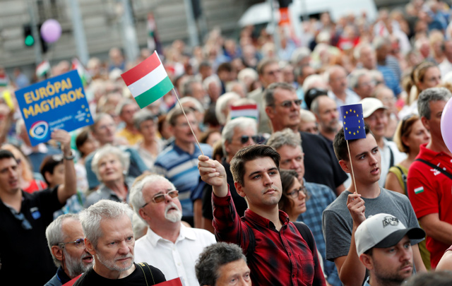 People attend a demonstration against Hungary’s Prime Minister Viktor Orban in Budapest, Hungary, on Sunday (Reuters photo)