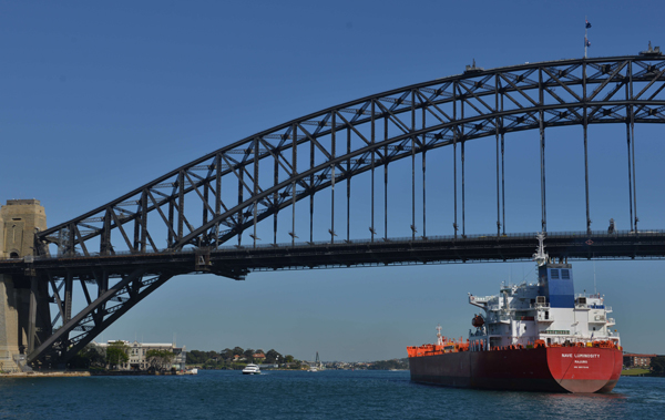 This photo taken on September 27 shows an oil/chemical tanker registered in the Marshall Islands sailing under Sydney Harbour Bridge after arriving in Australia. Australia on Tuesday hailed a deal to create the world’s largest free trade area as a huge opportunity for businesses, farmers and manufacturers to cash in on the burgeoning Asia-Pacific region (AFP photo)
