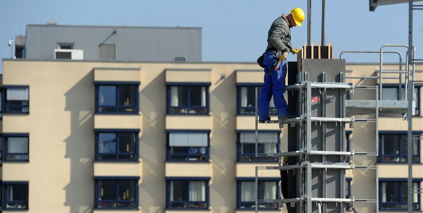This photo taken on March 22, 2012 in Essen, western Germany, shows a man working at a construction site (AFP photo)