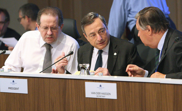 In this handout photo released by the European Central Bank, Mario Draghi (centre), president of the ECB, presides the Governing Council meeting in Malta on Thursday (AFP photo)