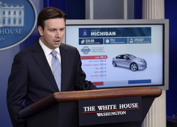 In this October 13 photo, White House Press Secretary Josh Earnest uses a graphic to discuss the Trans-Pacific Partnership during the daily briefing at the White House in Washington (AP photo)