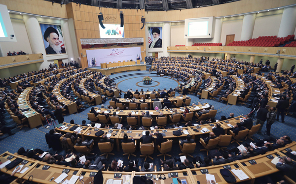 Participants listen to Iranian Oil Minister Bijan Namdar Zanganeh speech during the ‘Tehran Summit’ in the Iranian capital on Saturday (AFP photo)