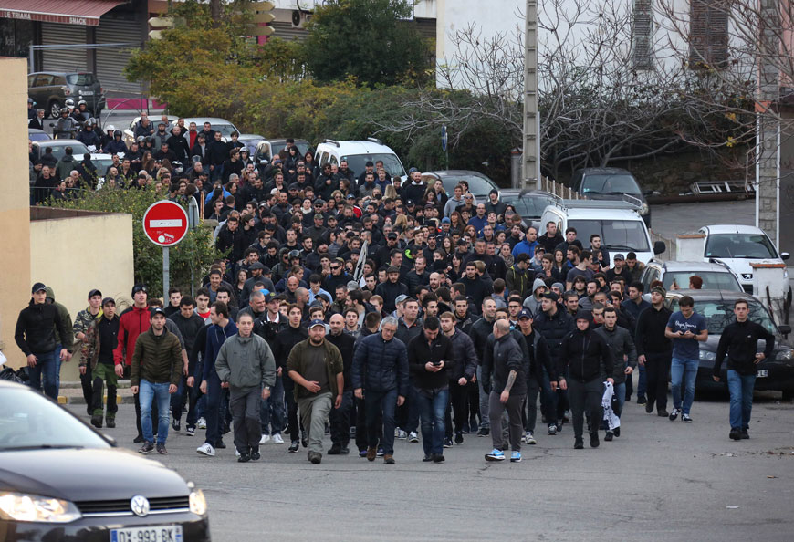 Demonstrators, most of them angry against Muslim residents, march in Ajaccio, on the French Mediterranean island of Corsica, on Saturday (AP photo)