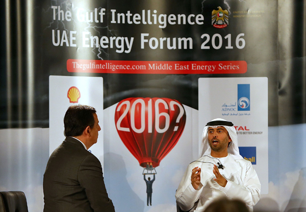 United Arab Emirates Energy Minister Suhail Bin Mohamed Al Mazroui (right) speaks during the 7th Gulf Intelligence UAE Energy Forum meeting in Abu Dhabi, on Tuesday (AFP photo)