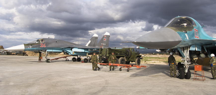 A pair of Russian bombers being readied for action at Hemeimeem air base in Syria on January 20. Russian warplanes have flown over 5,700 combat missions since Moscow launched its air campaign in Syria on  September 30, 2015 (AP photo)