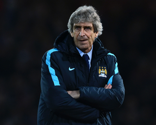 This file photo taken on January 23, 2016, shows Manchester City’s Chilean manager Manuel Pellegrini watching during the English Premier League football match between West Ham United and Manchester City at The Boleyn Ground in Upton Park, in east London (AFP photo by Ben Stansall)