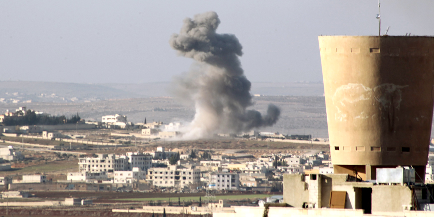 Smoke rises after air strikes by pro-Syrian government forces in Anadan city, about 10 kilometres away from the towns of Nubul and Zahraa, Northern Aleppo countryside, Syria, Wednesday (Reuters photo)