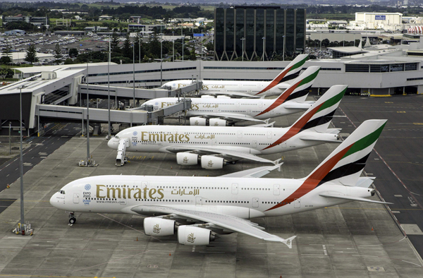 A handout photo taken on March 2, and received on March 3, shows four Emirates Airbus A380s lined up at Auckland Airport after one touched down in Auckland, completing what is believed to be the world’s longest non-stop scheduled commercial flight (AFP photo/Emirates/Ollie Dale)