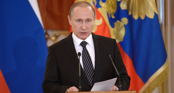 Russian President Vladimir Putin addresses members if the military in Moscow's Kremlin, Russia, on Thursday (AP photo)