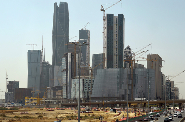A picture taken on March 9, 2016, shows towers under construction at the King Abdullah Financial District in the Saudi capital Riyadh. Towers in the complex are being built by the Saudi Oger Company and other constructors (AFP photo)
