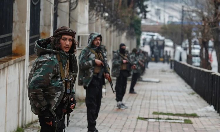 A monitor of Syria's conflict said Tuesday that at least four Druze fighters were killed in overnight clashes with security forces after they stormed a Damascus suburb (AFP photo)