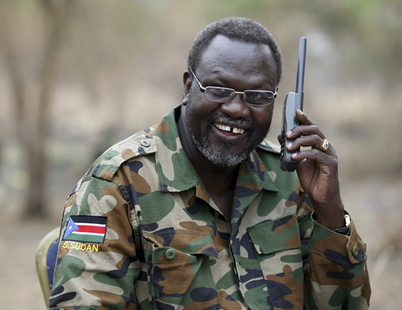 South Sudan’s rebel leader Riek Machar talks on the phone in his field office in a rebel-controlled territory in Jonglei State, South Sudan, February 1, 2014 (Reuters photo)