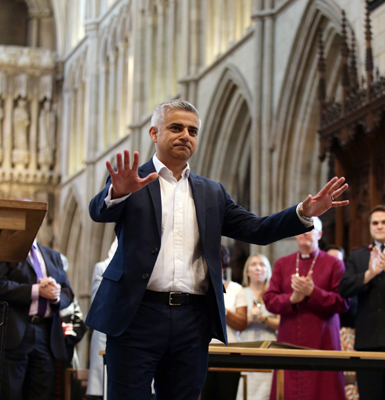 London’s new mayor, Sadiq Khan, gestures during the official signing ceremony in Southwark Cathedral, London, on Saturday (AP photo)