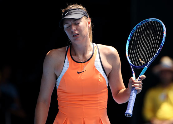 In this January 26 file photo, Maria Sharapova of Russia reacts after losing a point to Serena Williams of the United States during their quarter-final match at the Australian Open in Melbourne (AP photo by Rick Rycroft)