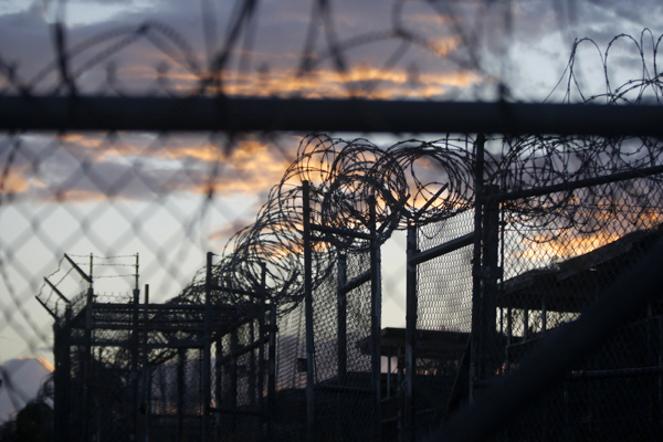 In this November 21, 2013 file photo reviewed by the US military, dawn arrives at the now closed Camp X-Ray, which was used as the first detention facility for Al Qaeda and Taliban militants who were captured after the September 11 attacks, at the Guantanamo Bay Naval Base, Cuba (AP photo)