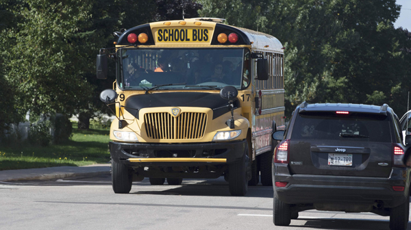 A school bus stops in Hillsborough Development in Charlottetown, Prince Edward Island, Canada, on Wednesday (Reuters photo)