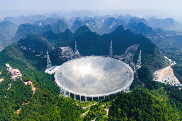 In this Saturday photo released by Xinhua News Agency, an aerial view shows the 500 metre Aperture Spherical Telescope in the remote Pingtang county in southwest China’s Guizhou province (AP photo)