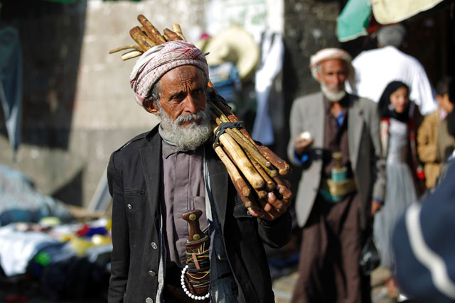 A Yemeni man walks at a market in the old city of the capital Sanaa on Friday (AFP photo)