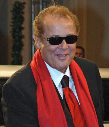 This file photo taken on December 11, 2006 shows Egyptian actor Mahmoud Abdel Aziz posing for photos upon his arrival during the second day of Dubai Film Festival in the Gulf emirate (AFP photo)
