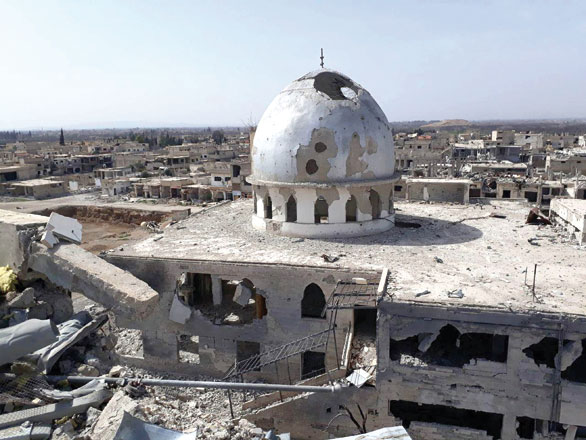 This handout photo released by the official Syrian Arab News Agency (SANA) on Sunday shows a general view of the destruction in the town of Al Nashabiyah in the besieged Eastern Ghouta region outside Syria's capital Damascus. (AFP photo)