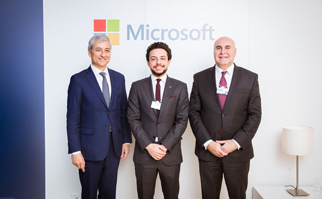HRH Crown Prince Hussein, Minister of State for Investment Muhannad Shehadeh (right) and Microsoft’s Executive Vice President and President of Global Sales, Marketing and Operations Jean-Philippe Courtois pose for a photo in Davos following the signing of an agreement on Thursday  (Petra photo)