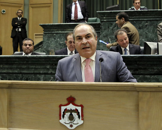 Prime Minister Hani Mulki addresses MPs as he responds to their remarks ahead of the vote of confidence on Thursday  (Photo by Osama Aqarbeh)