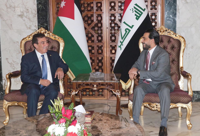   Lower House Speaker Atef Tarawneh meets with his Iraqi counterpart Mohammed Al Halbousi during a parliamentary conference for Iraq’s neighbours in Baghdad on Saturday (Petra photo)