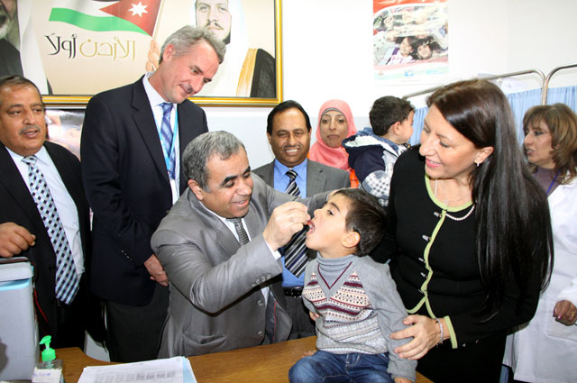A child receives polio vaccination in Amman in November 2014 (Petra file photo)