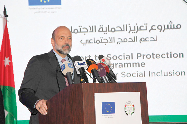 Prime Minister Omar Razzaz speaks during the launch of an EU-funded project to enhance social protection and integration (Petra photo)