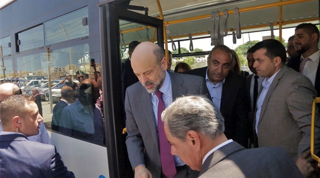 Prime Minister Omar Razzaz attends the inauguration of the first phase of 'Amman Bus' project on Sunday (Photo courtesy of Prime Ministry)