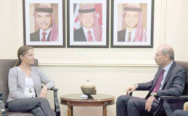 Foreign Minister Ayman Safadi meets with Swedish Ambassador Anna Hammargren of the Department for the Middle East and North Africa in Amman on Monday (Petra photo)