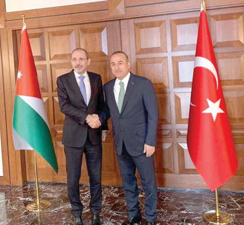 Foreign Minister Ayman Safadi (left) meets with his Turkish counterpart Mevlut Cavusoglu in Turkey on Tuesday (Photo courtesy of Foreign Ministry)