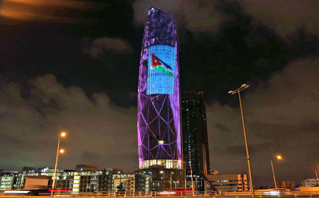 A photo of the Jordanian flag on display on a building in Abdali on Sunday (Photo by Raad Adayleh)