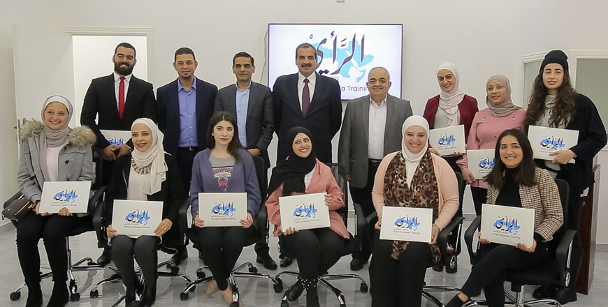 Farid Silwani, forth from left director general of the Jordan Press Foundation, poses for a photo with graduates of the journalistic writing and digital media course concluded this week at Al Rai for Media Training Studies (Photo by Abdullah Ayoub)