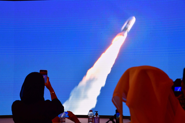 This file photo taken on July 20, 2020, shows a screen broadcasting the launch of the 'Hope' Mars probe at the Mohammed Bin Rashid Space Centre in Dubai (AFP photo)