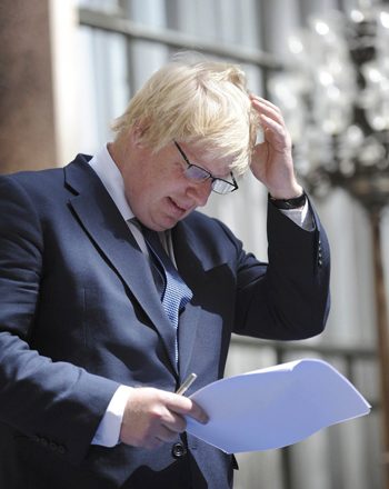 Britain’s Foreign Secretary Boris Johnson addresses staff inside the Foreign Office in London on Thursday (Reuters photo)