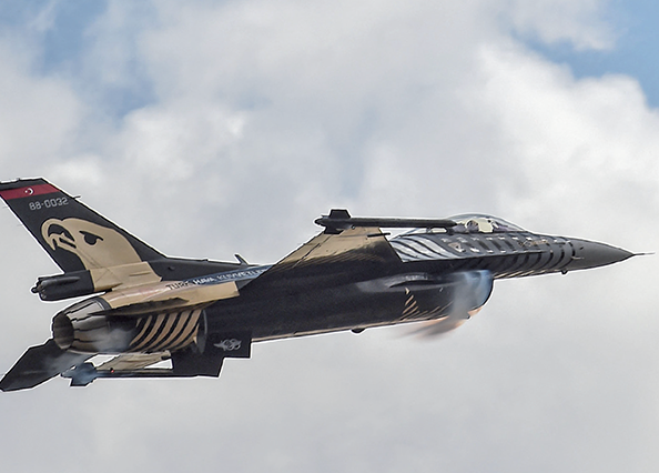 In this file photo taken on September 20, 2018, Solo Turk, the aerobatic team of the Turkish Air Force, fly their F-16 Fighters over Istanbul's new airport. Turkey announced on Sunday, it had carried out air strikes against outlawed Kurdish militant bases across northern Syria and Iraq (AFP photo)
